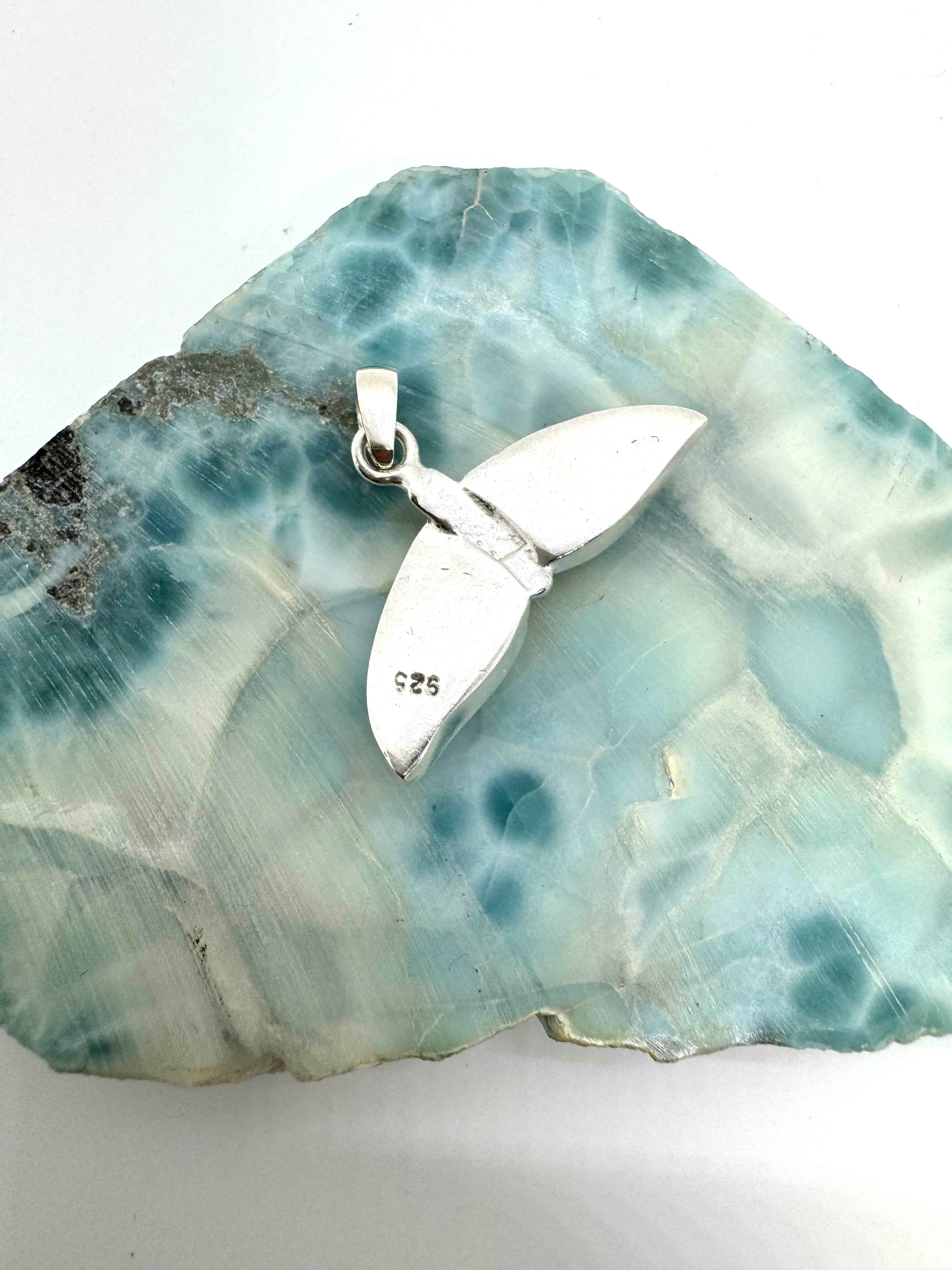 Whale tail pendant