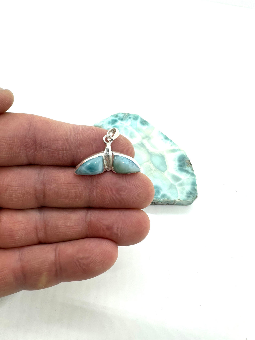 Whale tail pendant