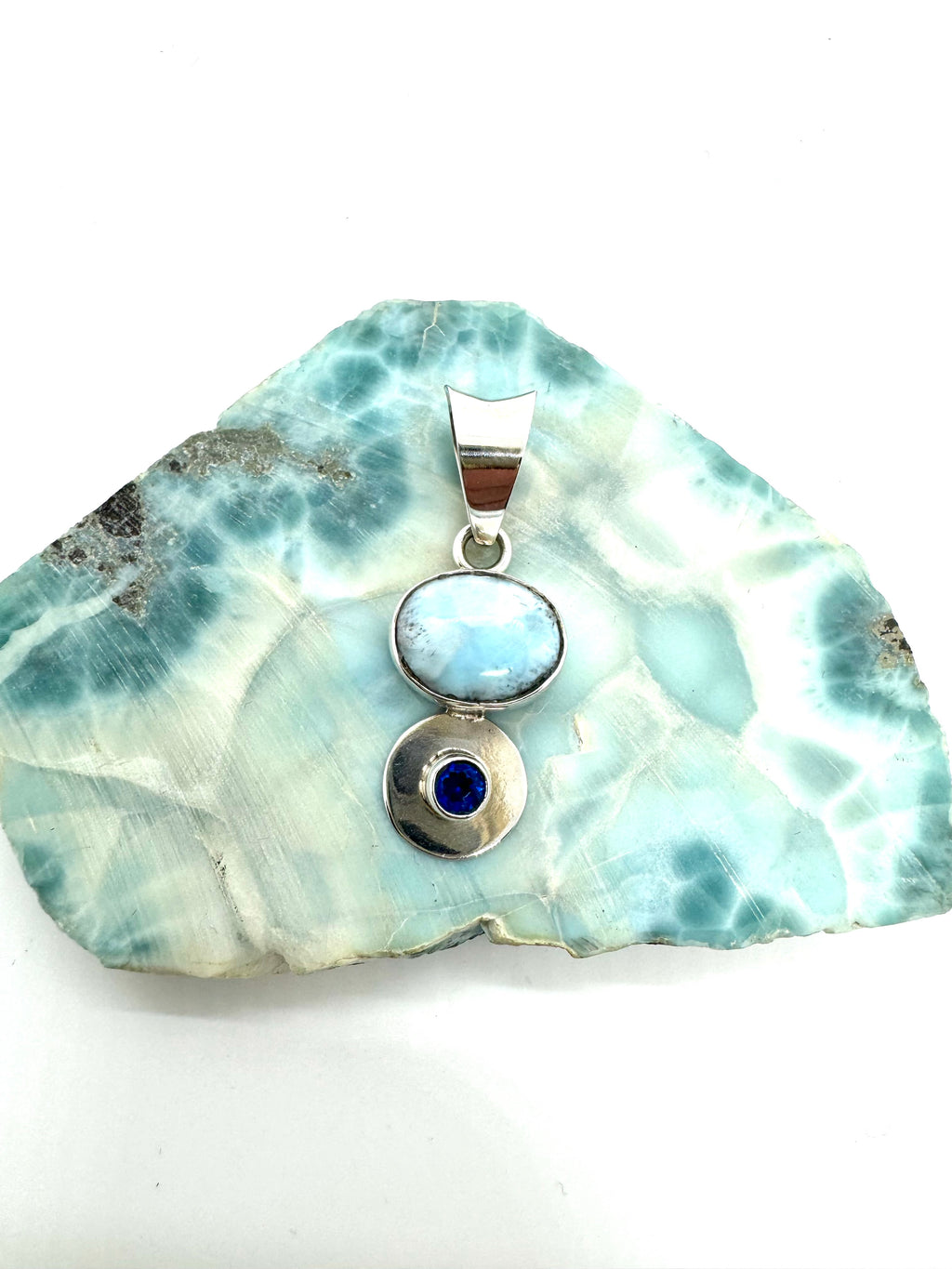 Larmar and topaz pendant