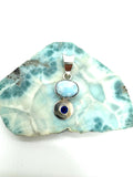 Larmar and topaz pendant