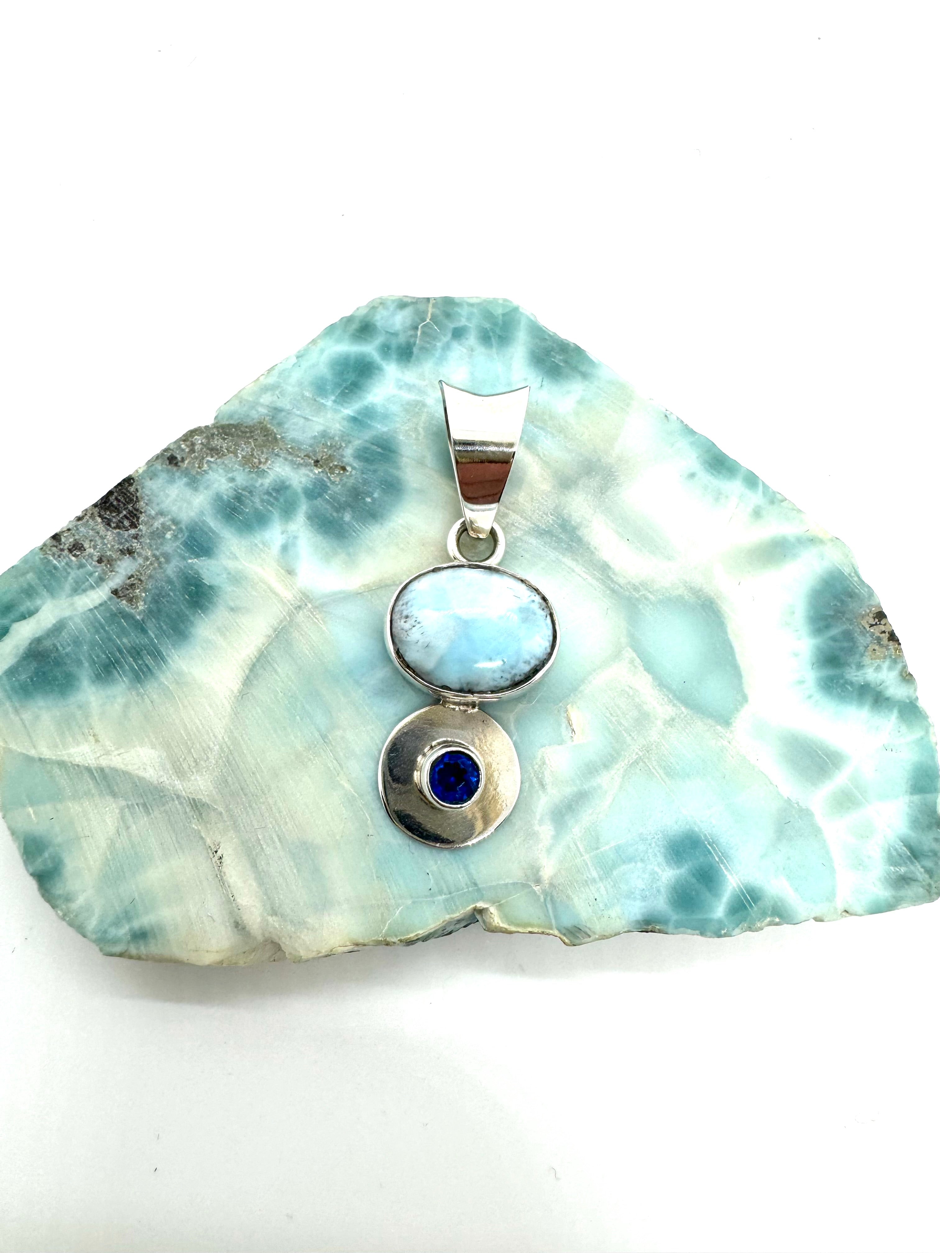 Larmar and topaz pendant