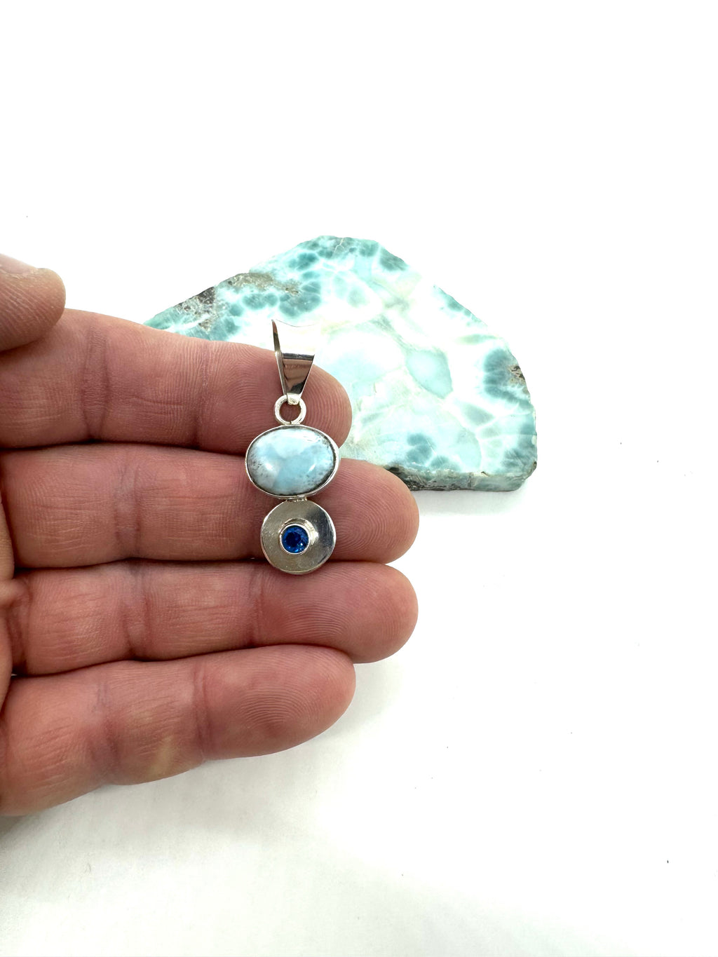 Larmar and topaz pendant