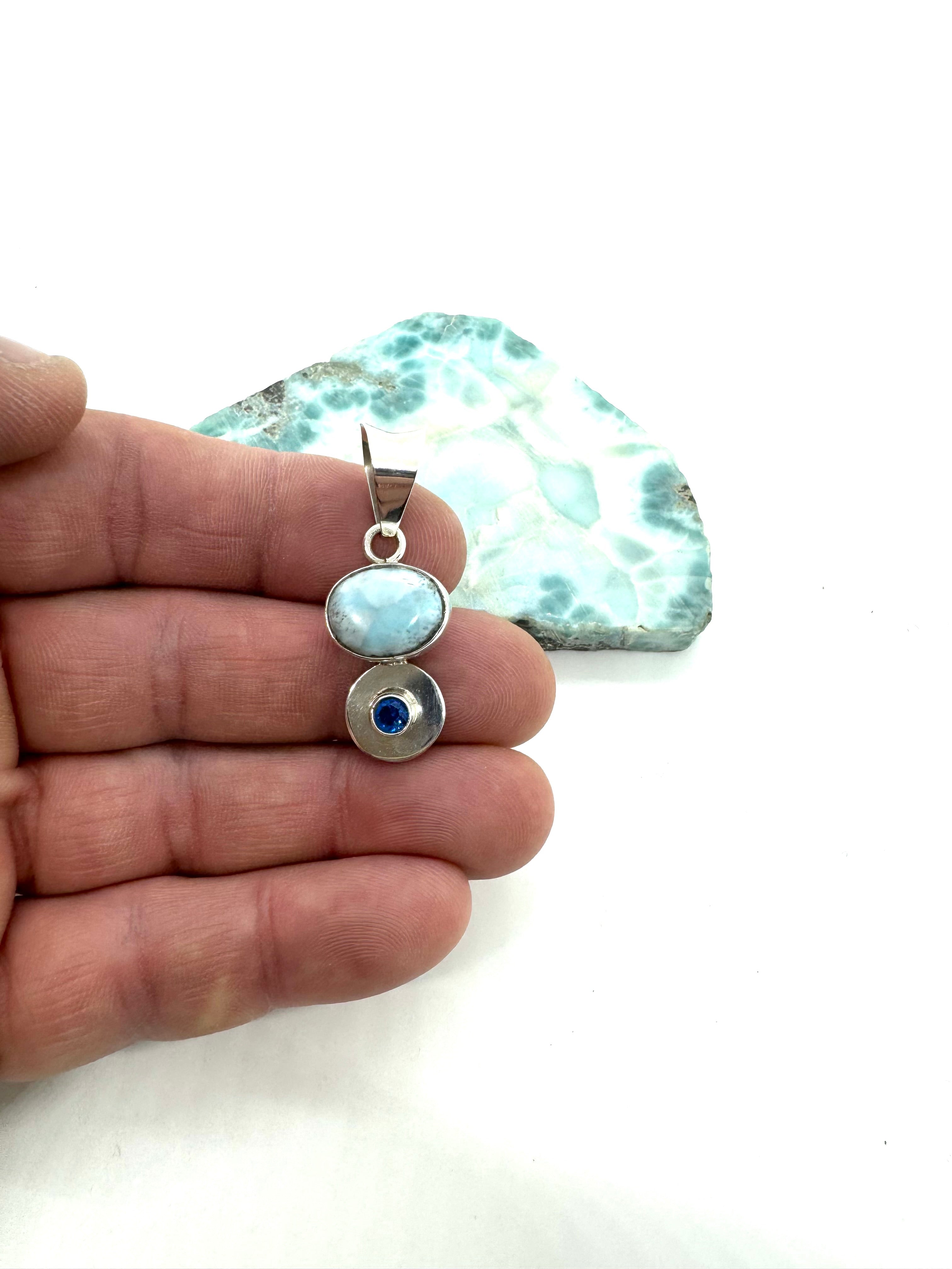 Larmar and topaz pendant