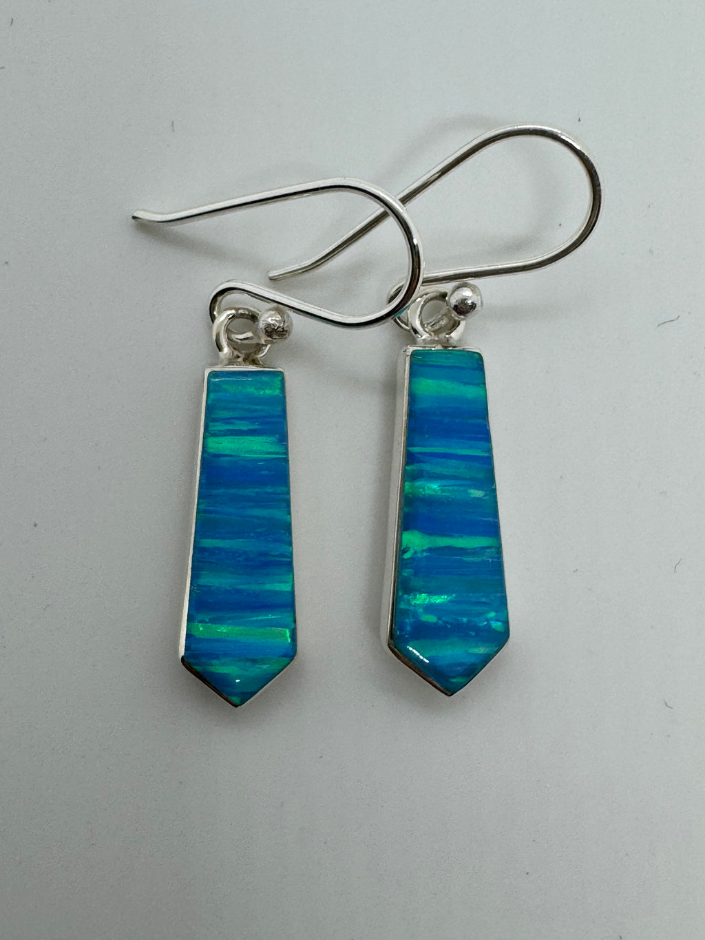 Ocean blue fire opal hanging earrings