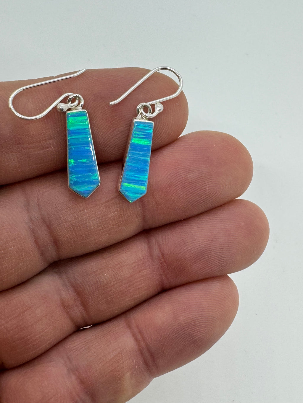 Ocean blue fire opal hanging earrings