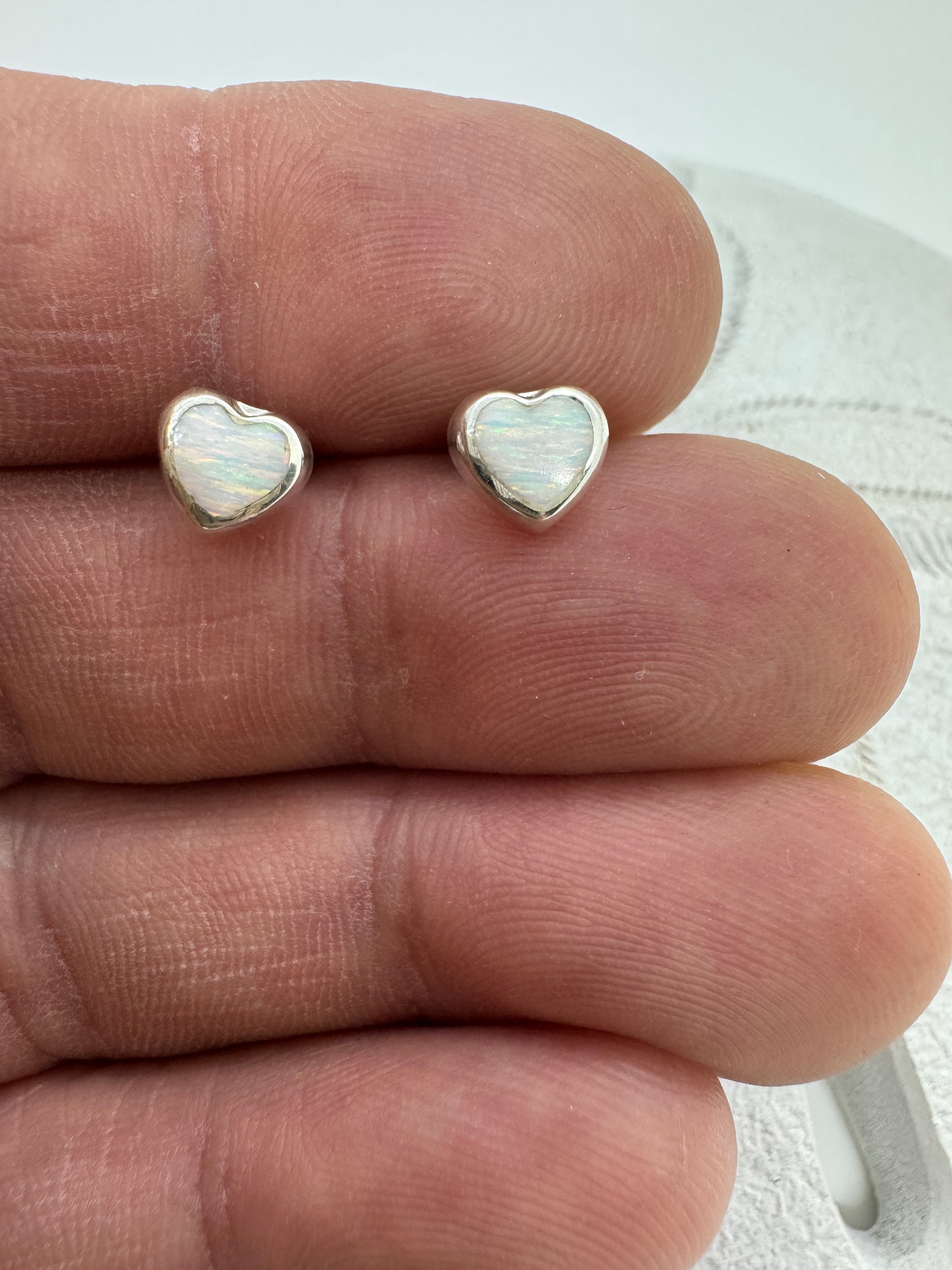 White fire opal heart post earrings