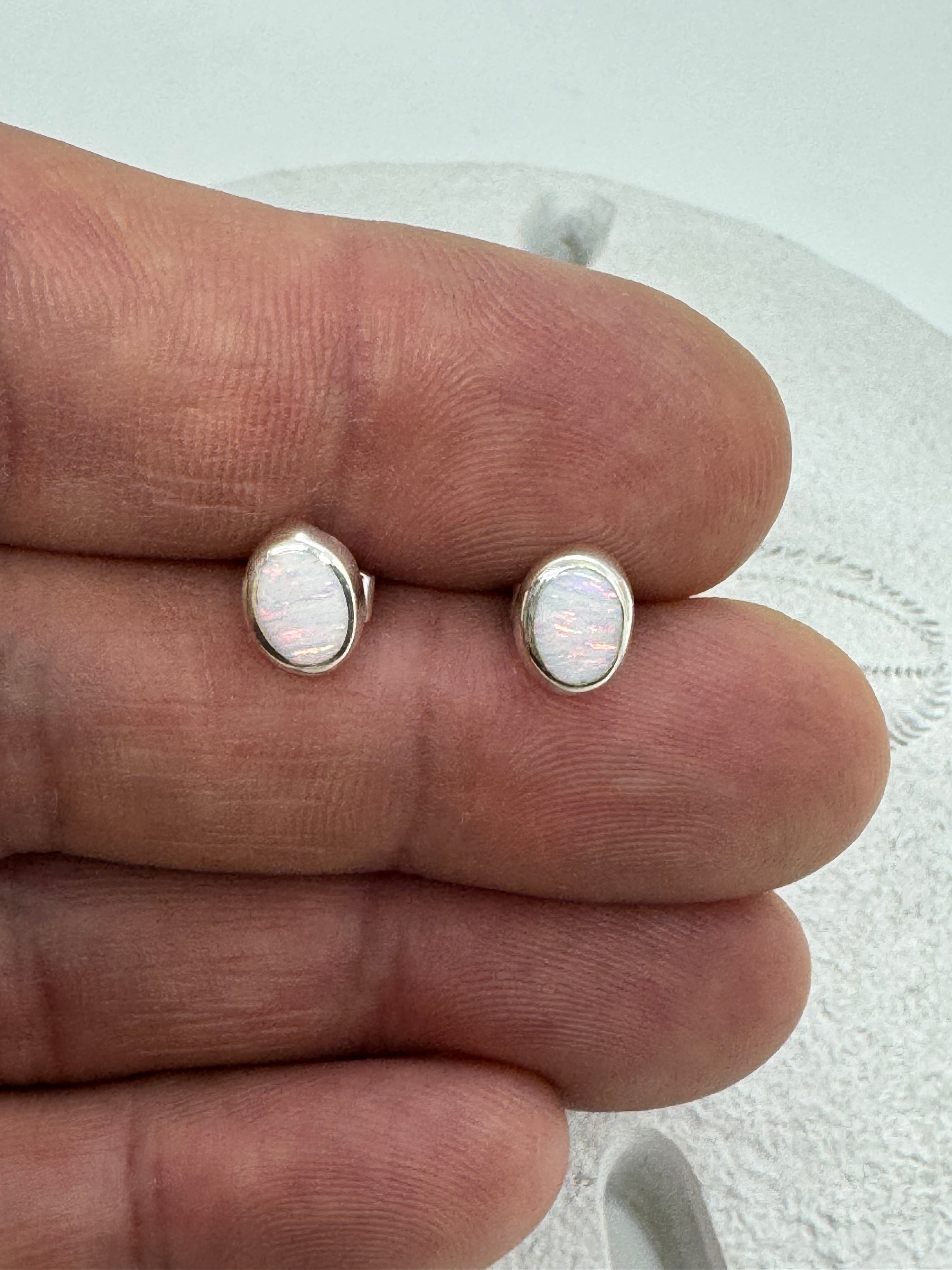 White fire opal oval earrings