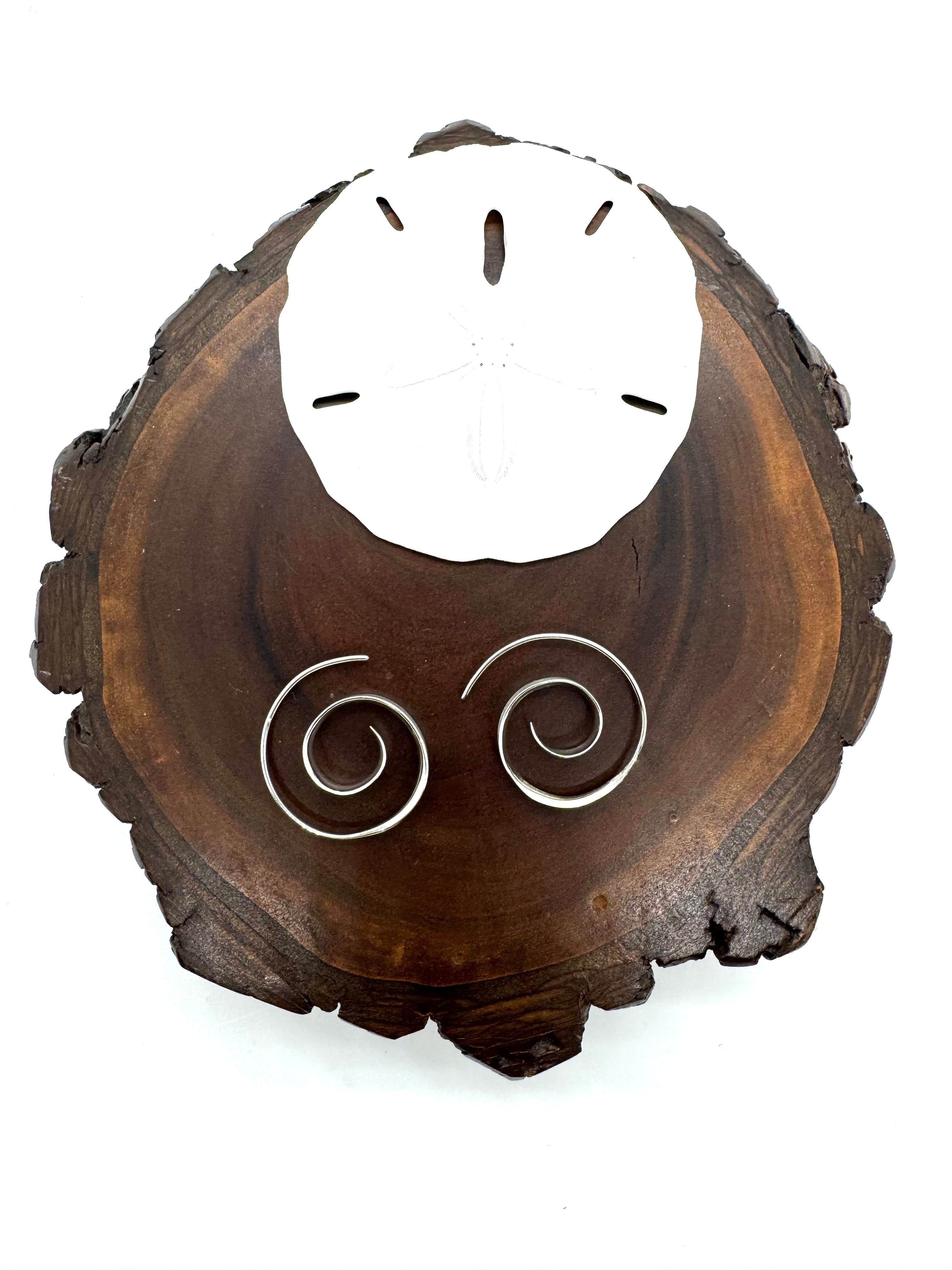 Title swirl earrings