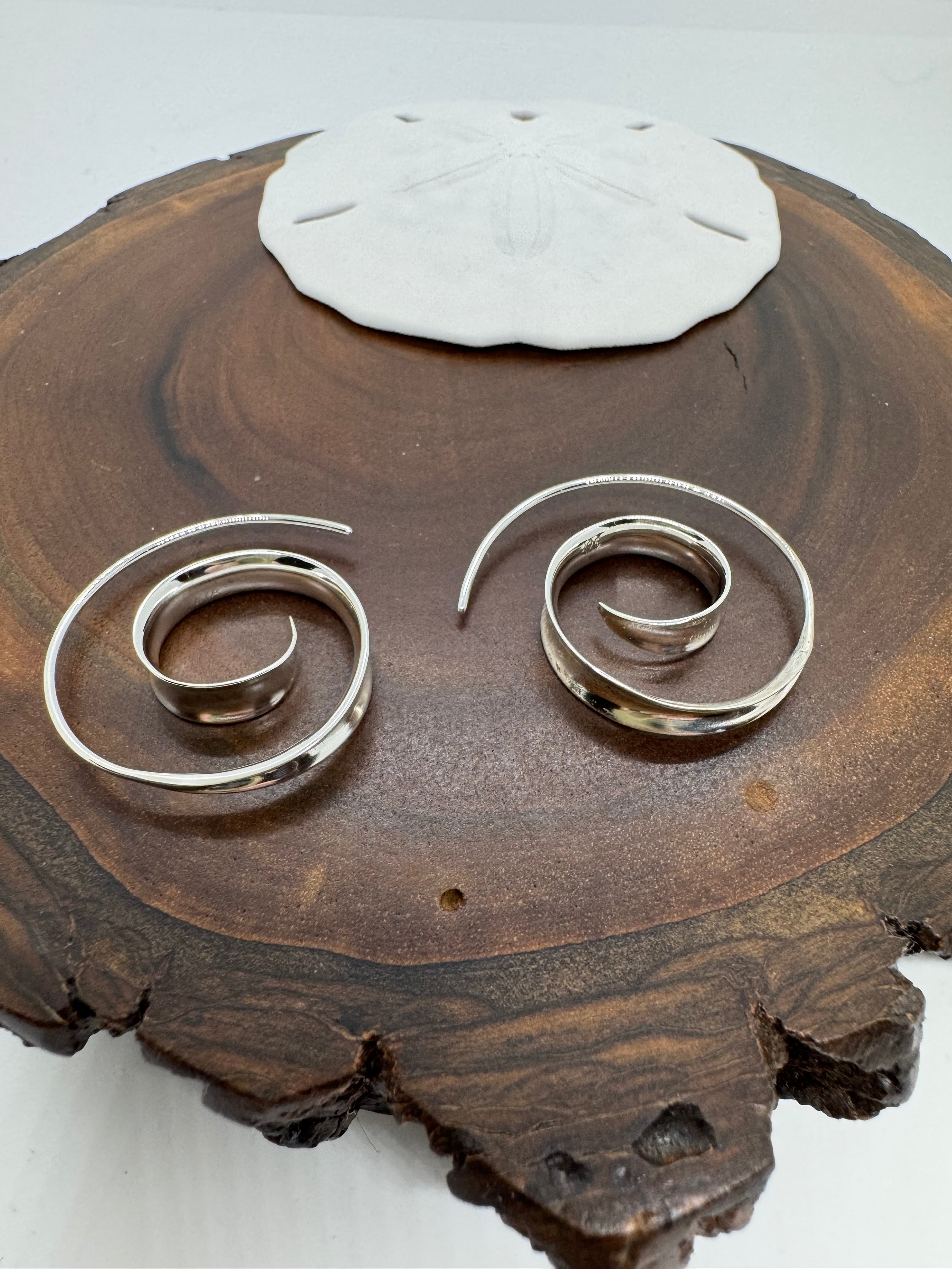 Title swirl earrings