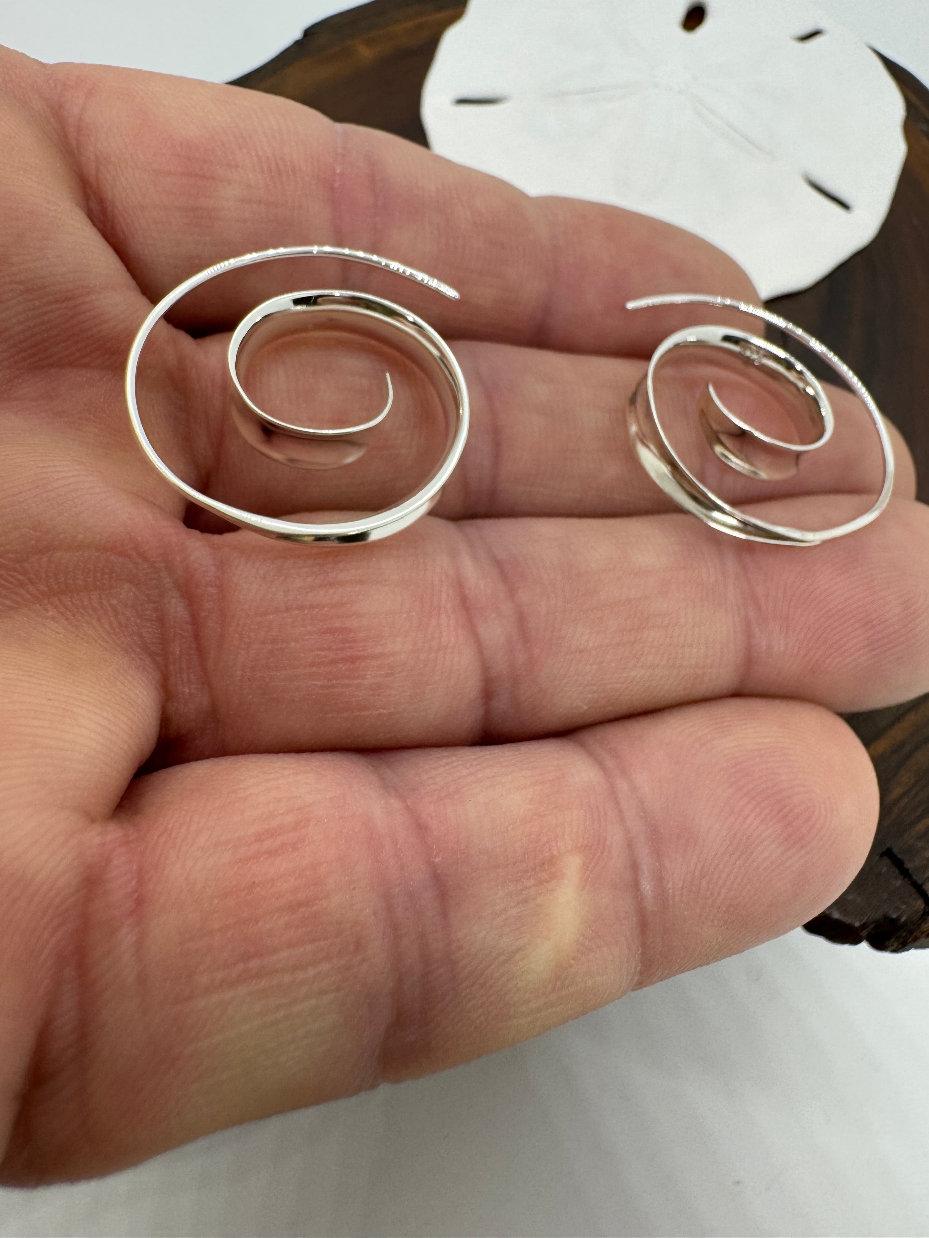 Title swirl earrings