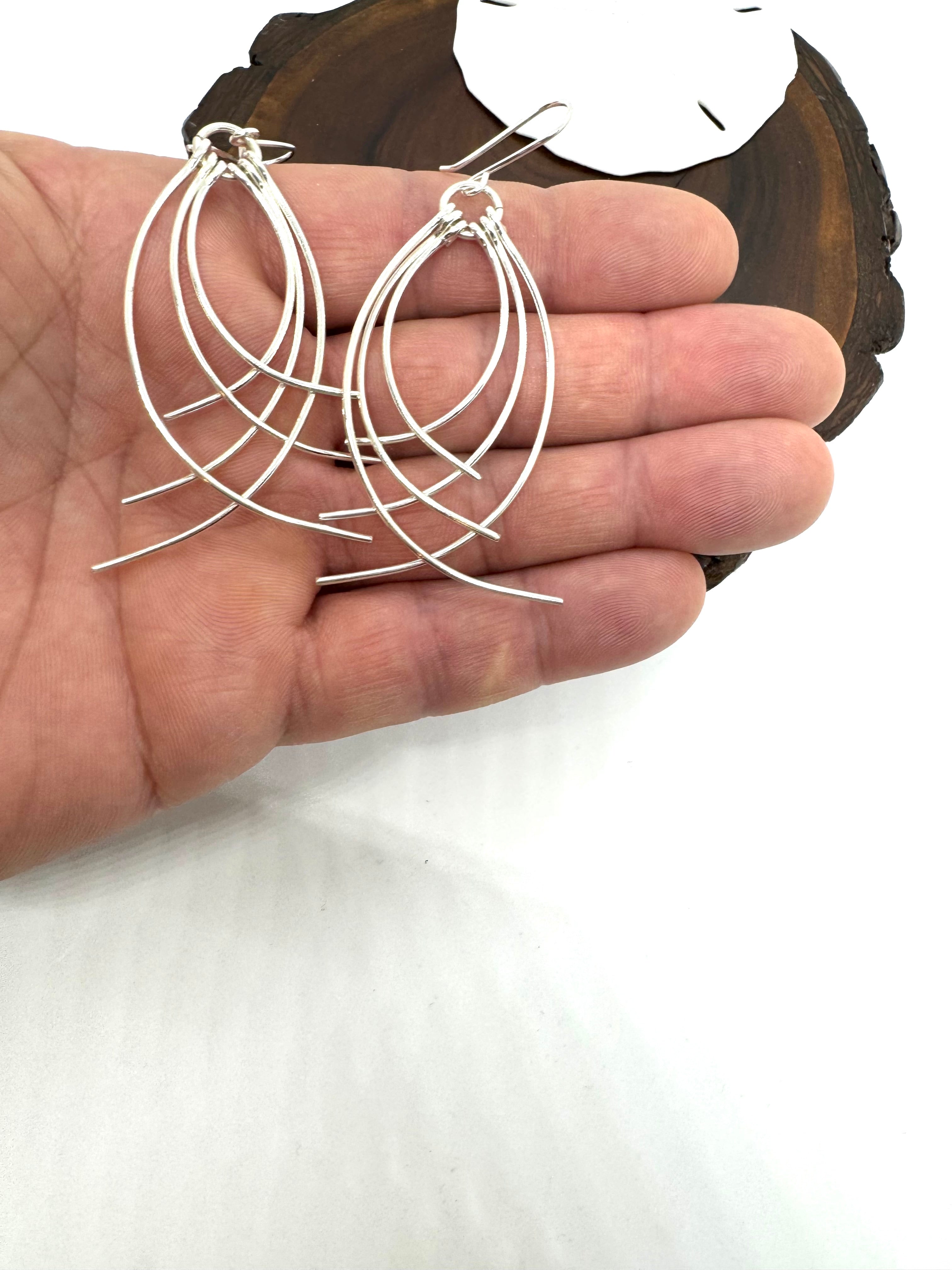 Lifestyle, silver hanging earrings