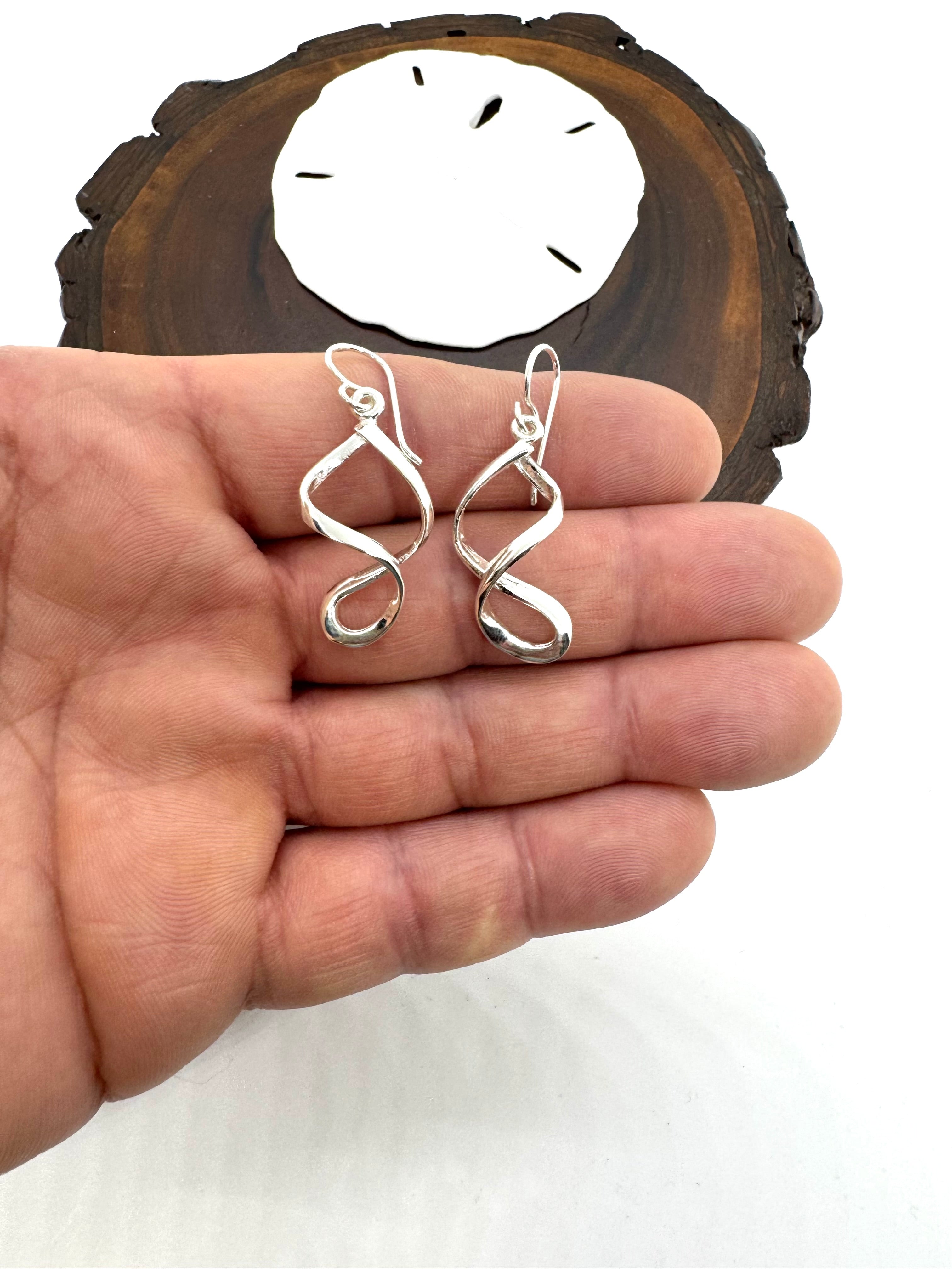 Spiral silver hanging earrings